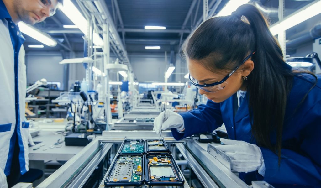 Woman Working On Smartphone